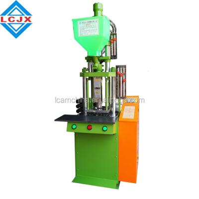 China VERTICAL 15 Ton Small Usb Cable Making Vertical Injection Molding Machine for sale