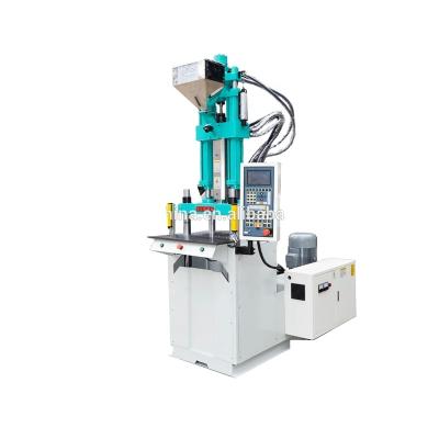 China VERTICAL Reliable Quality C14 Socket Vertical Plastic Injection Molding Machine 35T for sale