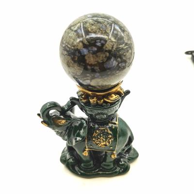 China Europe Wholsale Crystal Ball High Quality Resin Bass Carp Carving Elephant Shape Crystal Stand for sale