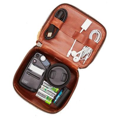 China Simple Vintage Organized Handcraft Technology Leather Dopp Kit Small Device Storage Travel Case for sale