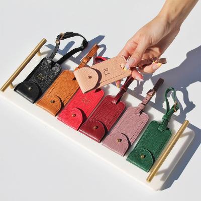 China Multifunctional Grained Leather Luggage Tag For Travel Essentials Name Genuine Pebbled Bag Tag Leather Luggage Tag for sale