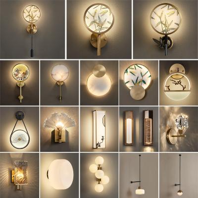 China Modern all new Chinese style luxury post-modern crystal bedroom living room TV arrangement wall light wal copper colored enamel wall lamp for sale