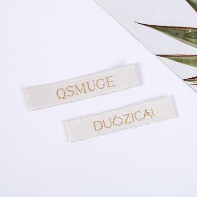 China Sustainable Universal washed Mark spot Ribbon Silk composition sewn-in label accessories clothing home textile care label logo Shipping mark for sale