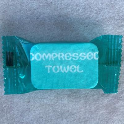 China Compressed Travel Towelettes 100% Cotton Compressed Towels Magic Towel for sale