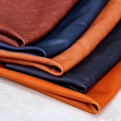 China Soft tanned vegetable first layer wind proof 2.0mm thick leather fabric milled genuine leather for bag shoes wallet for sale