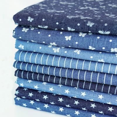 China Organic Summer Thin Butterfly Stripes Stars Cotton Material Printed Denim Fabric For Jeans Clothing Dress for sale