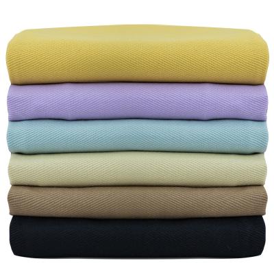 China Hot sale organic colored cotton washed twill denim fabric for pants jacket skirt clothing sewing fabrics for sale