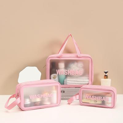 China PVC Large Capacity Storage Handheld Transparent Waterproof Cosmetic Bag For 2023 Korean Fashion Travel Toiletries for sale