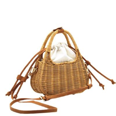 China 2022 New High Quality Rattan Straw Bag Rattan Basket Lift Handle Shoulder Cross - Body Women's Bag for sale