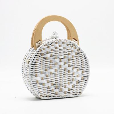 China High Quality Made in China New Semicircle Rattan Bag Straw Bag Portable Woven Handheld Beach Bag for sale