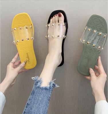 China Fashion Trend Fashion Rivets New Flat Bottom Beach Slippers For Women for sale