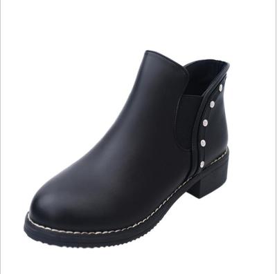 China Fashion Trend Autumn And Winter Thick-heeled Short Round-Toe Rivet Boots for sale