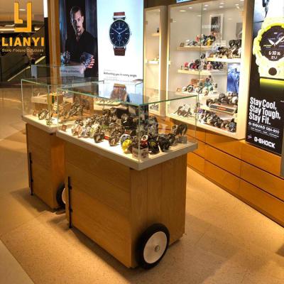 China Modern or Customized Portable Rotating Smart Watch Display Stand with Custom Wheel Jewelry Watch Store Display Furniture for sale