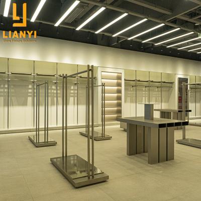 China Fashionable Brushed Stainless Steel Sports Clothing Display Racks Furniture For Clothing Store Interior Design Ideas for sale