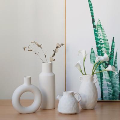 China New modern wholesale special-shaped creative hydroponic ceramic flower arrangement in vase decoration zu verkaufen