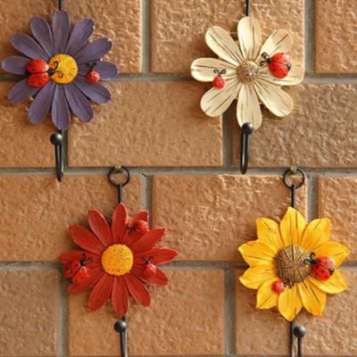 China Creative Fresh Flower Placed Things Form Iron Home Art Wall Hanging Wall Hook Decoration Resin for sale