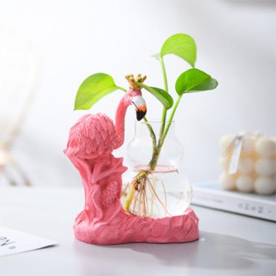 China Flower Arranging Pink Bottle Ornament Flamingo Hydroponics Plant Celebrity Ins Web Glass Vase for sale