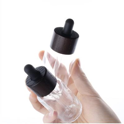 China 30ml 1oz Viable Bamboo Wood Lid Glass Dropper Bottle For Liquids Essential Oil Cosmetic Tinctures Caps Aluminum Droplet Bottles for sale