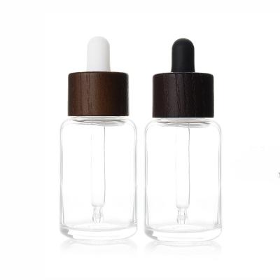 China 1oz 30ml Wooden Lid Viable Leak Proof Glass Dropper Bottle For Essential Oil Serum Tinctures Trial Bottles With Bamboo Screw Top for sale