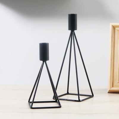 China Morden Eco-friendly Metal Copper Black Hollow Out Gifts Home Candlestick Candle Holder Decorative Items Decor Candlestick Holder for sale