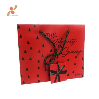 China Recycled Materials Customize Fancy Design Christmas OEM Printing Gift Paper Shopping Bag With Label for sale