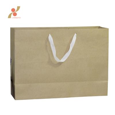 China Recyclable Wholesale Custom Color Kraft Paper Shopping Bag for sale