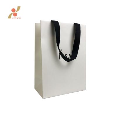 China Custom Simple Luxury Skin Care Paper Art Packaging Shopping Bag Recyclable With Logo for sale