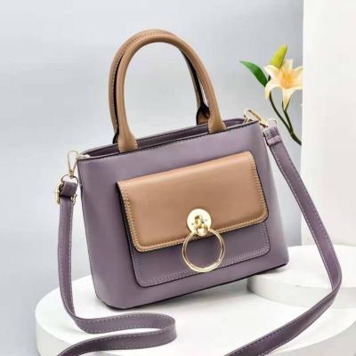 China Other 2021 solid color women's simple elegant irregular geometric embossed leather handbag for sale