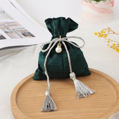 China Drawstring Round Bottom Yellow In Color Flannel Jewelry Drawstring Bags Earphone Running Gift Bag for sale