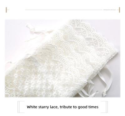 China In Stock 2022 New White Star Lace Drawstring Yarn Bag Wick Yarn Jewelry Gift Lace Storage Bags for sale