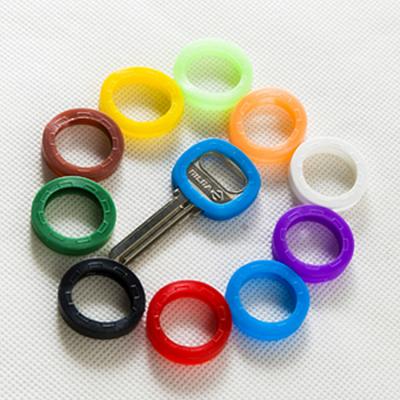 China Wholesale Colorful Hollow Key Chain Silicone Key Covers Topper Key Holder Elastic Keyring Rings for sale