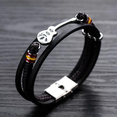 China 2020 Wholesale Hot Selling Simple Design Punk Black Leather Bracelet Hawaiian Guitar Buckle Handmade Woven Stainless Bracelet for sale