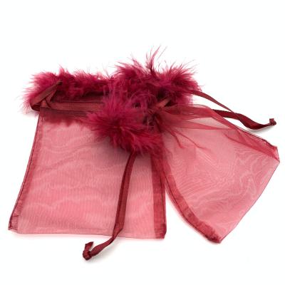 China Gift Most Popular Wholesale Goods Fashionable Recyclable Organza Customized Medium Bags With Feathers for sale