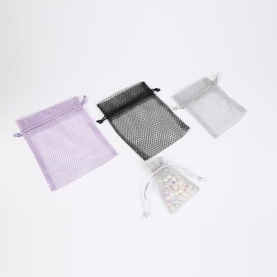 China Top Selling Gift Top Selling Polyester Material Soft Soap Universal Elastic Black Drawstring Mesh Bags for sale