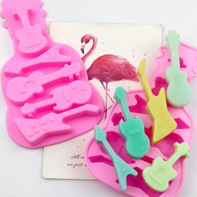 China Viable 5 Hole Musical Instrument Guitar Chocolate Mold DIY Baking Soap Mold Cake Mold Handmade Silica Gel Ice Tray for sale