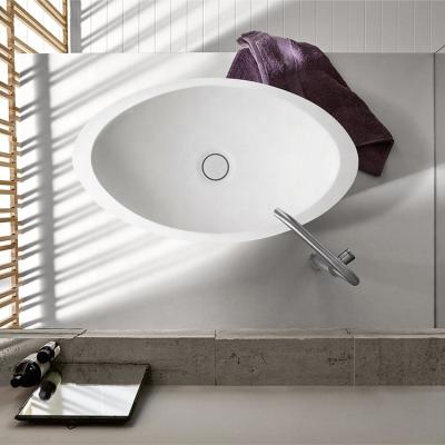 China Modern nordic solid surface countertop price bathroom sink small oval artificial stone hand washbasin for sale