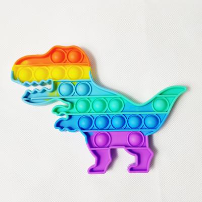 China Color Funny Educational Dinosaur Toy Stress Relief Bubble Fidget Toy Push Pop Bubble Rainbow Sensory Toy for sale