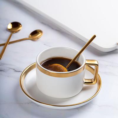 China Matte White Ceramic Porcelain Coffee Tea Cups Saucers Sets With Gold Handle 250ml Volume for sale