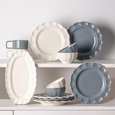 China Solid Color Dinnerware Set Nordic Style Ceramic Plates And Bowls With Sunflower Shape for sale