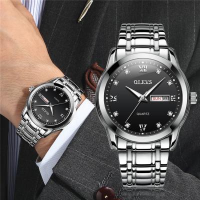 China OLEVS 8691 stainless steel men's non-specific heavy watches date and week quartz men's wristwatches waterproof luminous hands synchronize male watch for sale