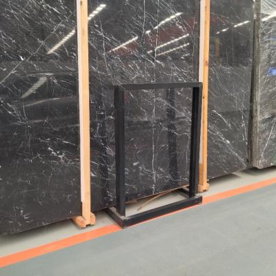 China Modern Wholesale Factory Direct Italian Kali Tile 30x60 Dining Table Stone Black Marble With White Vein for sale