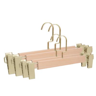 China Solid Wood Pants Hanger Minimalist Adjustable Clips Hangers Set Custom Logo Fashion Classic Casual Hanger 2022 Storage Racks for sale