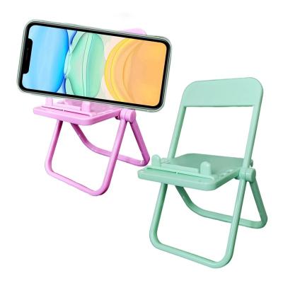 China China Mini Folding Cute Cell Phone Holder Hot Selling Adjustable Cell Phone Chair Shape Plastic Portable Desk Holder for sale