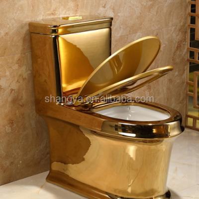 China Automatic Operation Stun High Luxury Ceramic Bathroom Washdown Flushing One Piece Gold Toilet Pan for sale