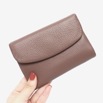 China Simple Classic Triple Money Bag Wave Simple Design Snap Women Cowhide Casual Card Holder Clutch Coin Pinch Female Short Wallets for sale