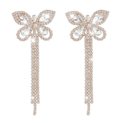 China Luxury Temperament 925 Silver Butterfly Full Diamond Butterfly Tassel Earrings Long Vintage Light Claw Earrings for sale