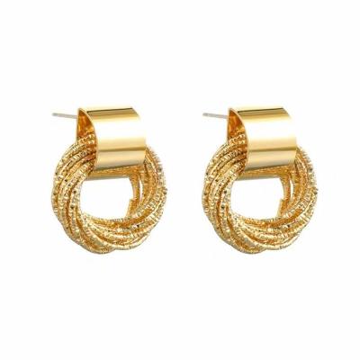 China Environmentally friendly S925 needle silver short design temperament metal texture elegant earrings surround winding earrings for sale