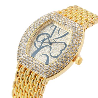 China New day/date style temperament fashion diamond inlaid barrel shaped women's watch all over the sky star roman quartz luxury watch for sale