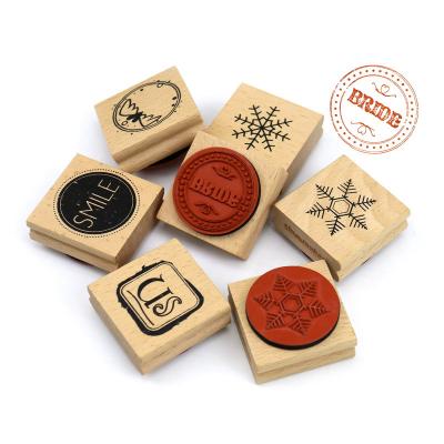 China Hot Selling Custom Eco-friendly Wooden Handle Diary Office Embossing Logo Wood Rubber Stamp Name for sale