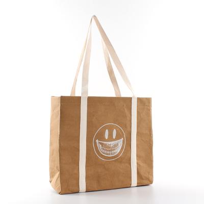 China Eco - Friendly Custom Waterproof Reusable Durable Washable Kraft Paper Tote Bags for sale